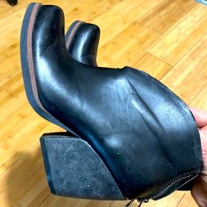 Korks black leather booties